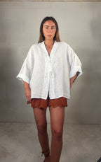 Blusa con lacci frontali over 100% lino