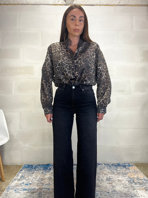 Denim nero elasticizzato a palazzo