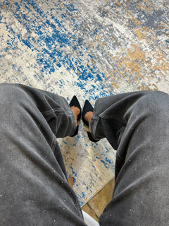 Jeans baggy nero con punti luce