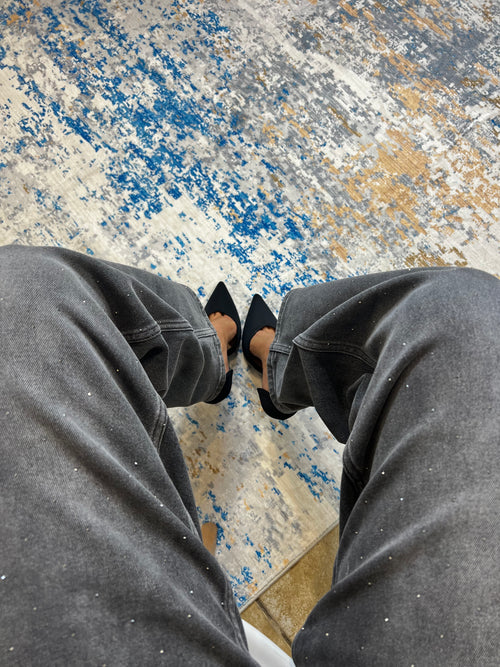 Jeans baggy nero con punti luce