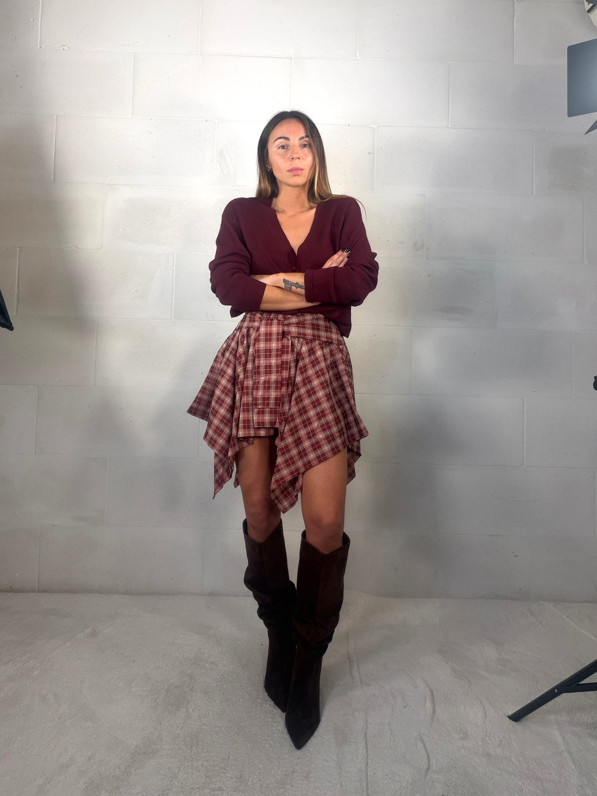 Gonna tartan asimmetrica con nodo frontale bordeaux 