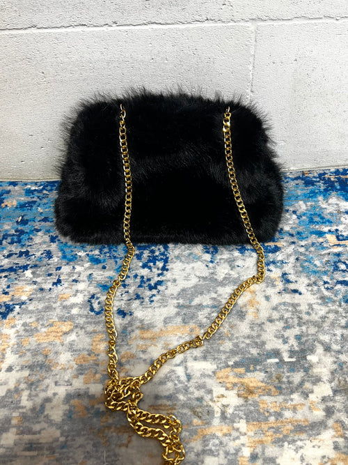 Borsa clutch in ecopelliccia nera