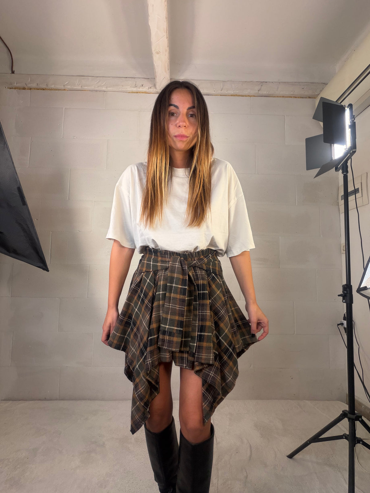 Gonna tartan asimmetrica con nodo frontale in flanella verde scuro