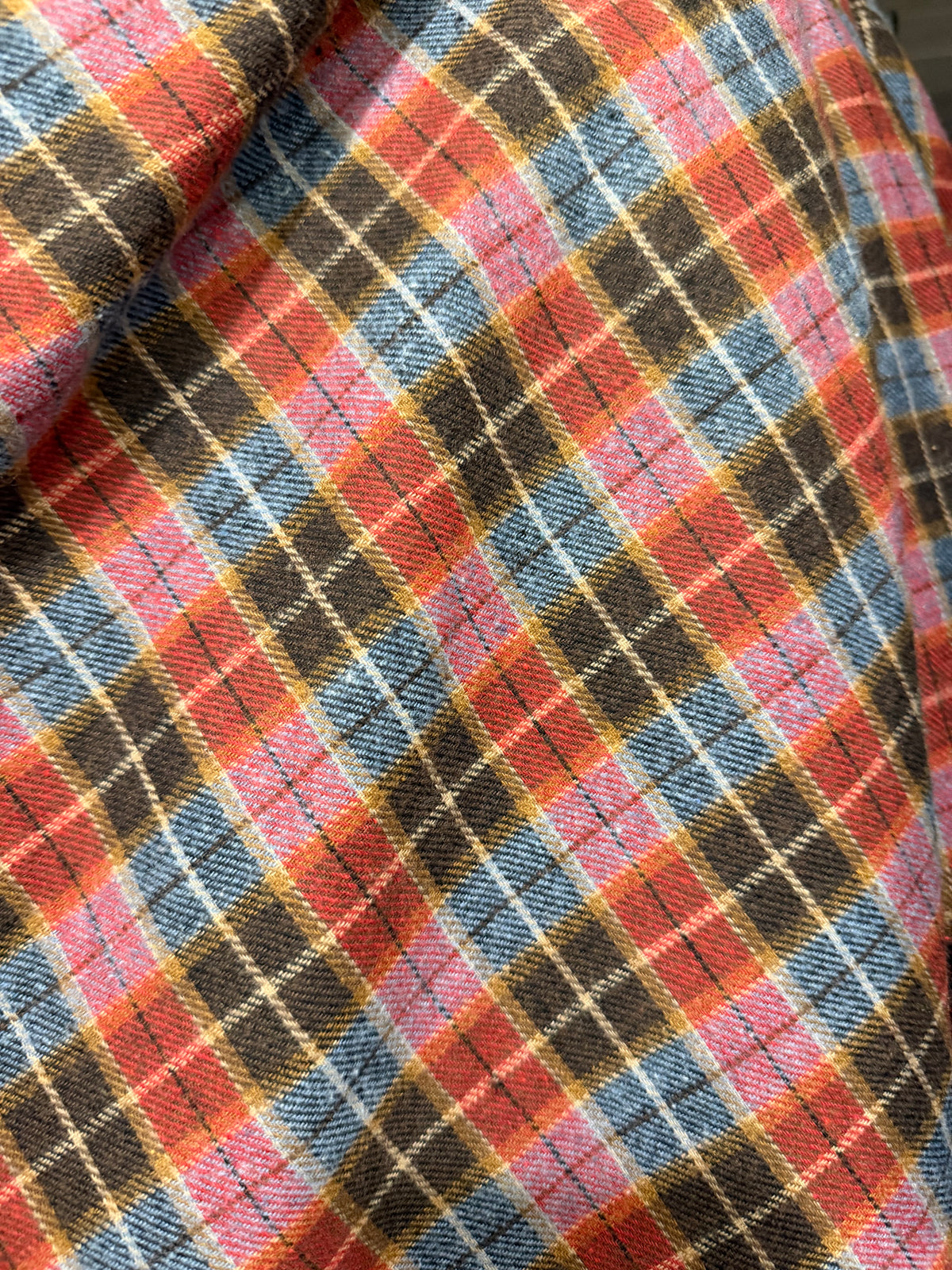 Gonna tartan in flanella asimmetrica con nodo frontale multicolore