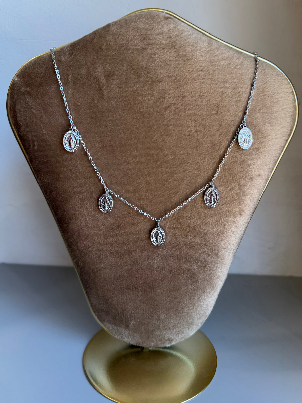 Collana multi madonnine argentata