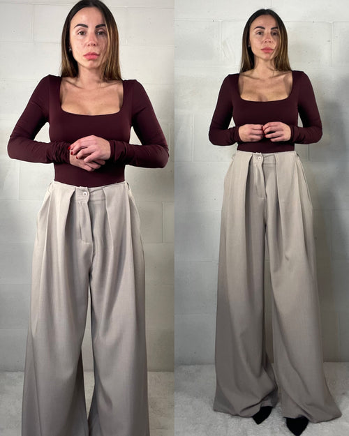 Pantalone ampio con pence beige chiaro