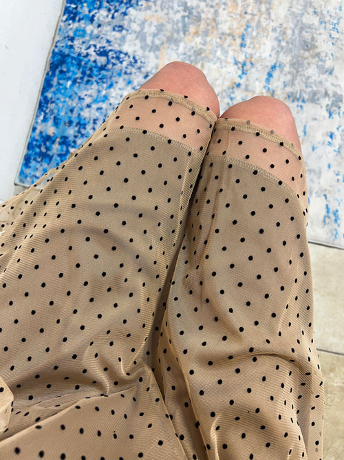 Abito ampio velato nude con pois