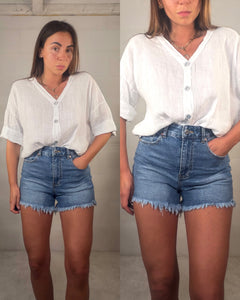 Short in denim frangette